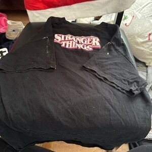 Stranger things, black, little bit of white paint but matches with shirt, comfy